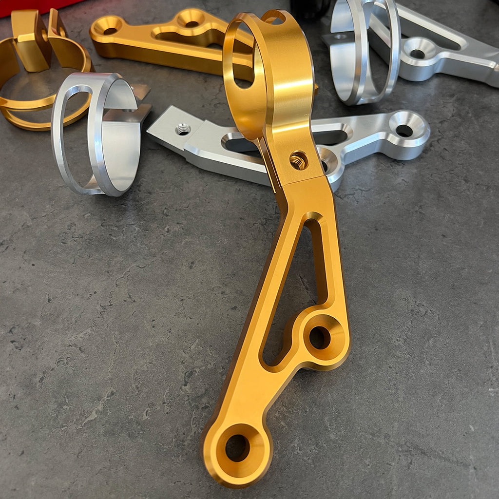 Carbon Visionary Shark Tail Reservoir Brackets Ohlins & Legend