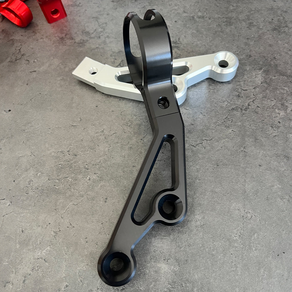 Carbon Visionary Shark Tail Reservoir Brackets Ohlins & Legend